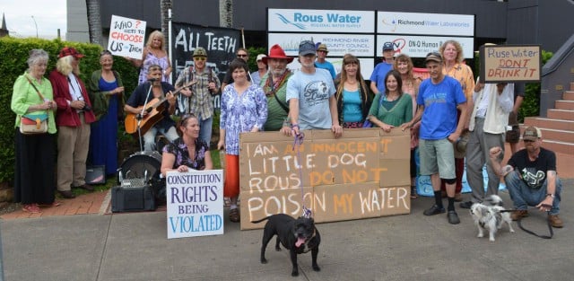 Anti fluoride protesters outside Rous Water yesterday. (Picture Robert Hearne)
