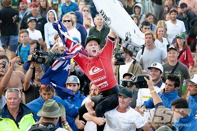 Mick Fanning, a four-time winner of the Quiksilver Pro in France chaired up the beach after his win. Photo ASP