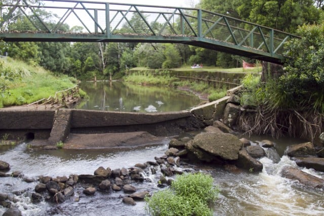 The 'Bangalow Waterfront', looking decidedly less glamorous now that the broken Bangalow Weir has been fenced off by Council. But plans are afoot to revive it. Photo Jeff Dawson