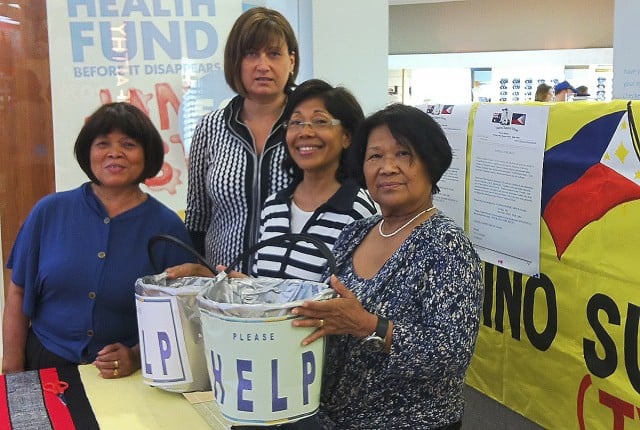 Richmond MP Justine Elliot together with members of the Tweed Fillipino support group raising funds for victims of Typhoon Haiyan.