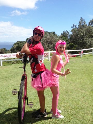 Actor Samuel Johnson, pictured here with Byron Breast Cancer Support Group's Anna-Maree, is unicycling his way around Australia to raise money and awareness for breast cancer after his sister was diagnosed with the disease.