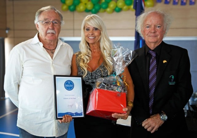 Ballina Shire Citizen of the Year Tracey Everingham accepts her awards from guest speaker George Negus and Ballina shire mayor David Wright.