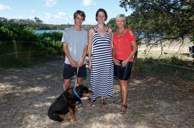 Jacquie Lute's son Mathew Lute (with dog Gypsy) and friends Tahlia Loughnan and Annie Radermacher who plan to place a memorial bench for Jacquie at Brunswick Heads. Photo Eve Jeffery