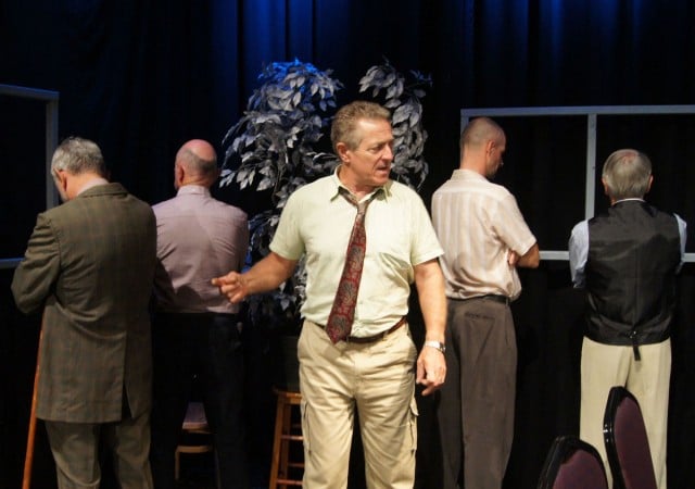 Juror Ten (Carl Moore) is stunned and uncomprehending as his peers reject him.