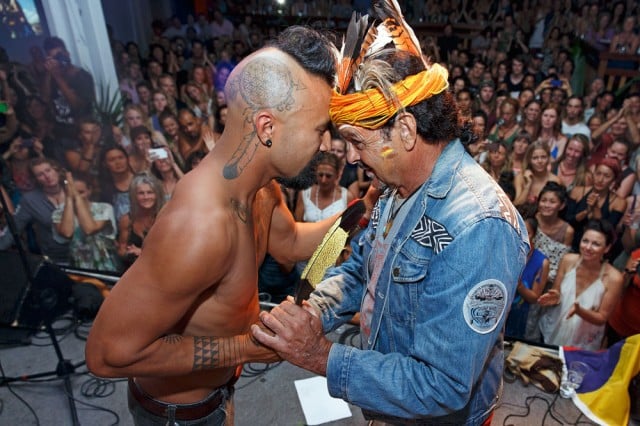 Bunna Lawrie, Songman of the White Whale and lawman of the Mirning tribe from the Nullabor, presents a Black Cockatoo feather to headline act Nahko, of Nahko and Medicene for the People. Photo The Tree Faerie.
