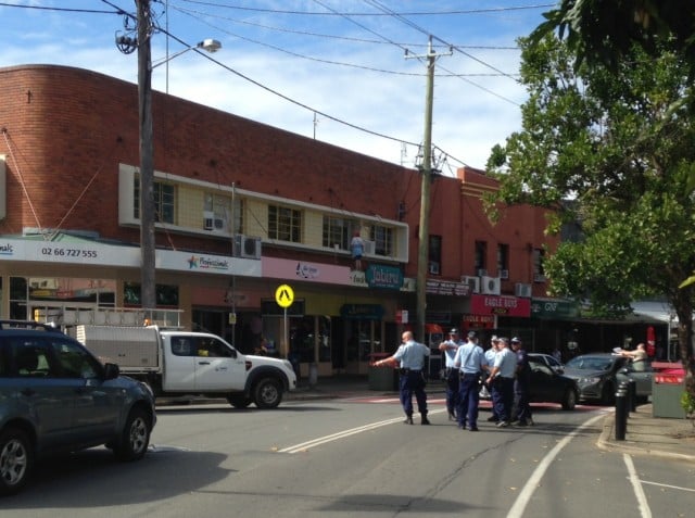 Police in Murwillumbah's Main Street yesterday soon after the incident which saw an elderly couple and some officers injured when police tried to apprehend a motorist who did a burnout. Photo supplied