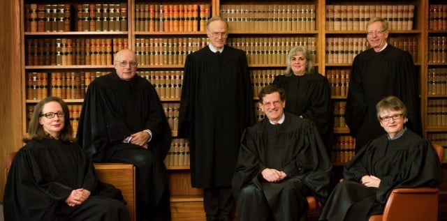 Justices of the High Court of Australia: (standing, left to right) Justice Heydon AC, Justice Crennan AC, Justice Hayne AC; (seated, left to right) Justice Kiefel, Justice Gummow AC, Chief Justice French AC, Justice Bell.