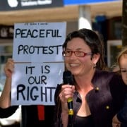 Activist Emma Capp and son Jetta at the Lismore rally yesterday. Emma has spent seven years in Tasmania, and has witnessed first hand the crack-down on protests. (Darren Coyne) 