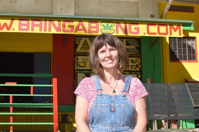 Louise Grenfell outside the Nimbin Bush Theatre building, where Bringabong is being relocated after the fire.