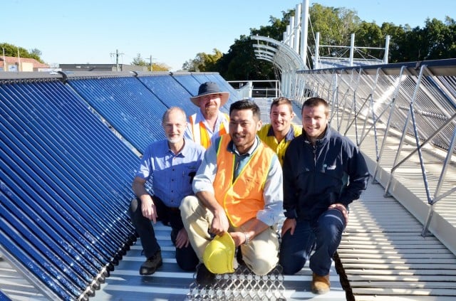 With the new solar evacuated tube system (solar hot water) on the roof of the Lismore Memorial Baths are (l-r) Powersmart Energy Auditor Michael Qualmann, Lismore City Council’s Steve Dillon and Anton Nguyen, and Laser Plumbing’s Brett Eaglesham and Jake Campbell.