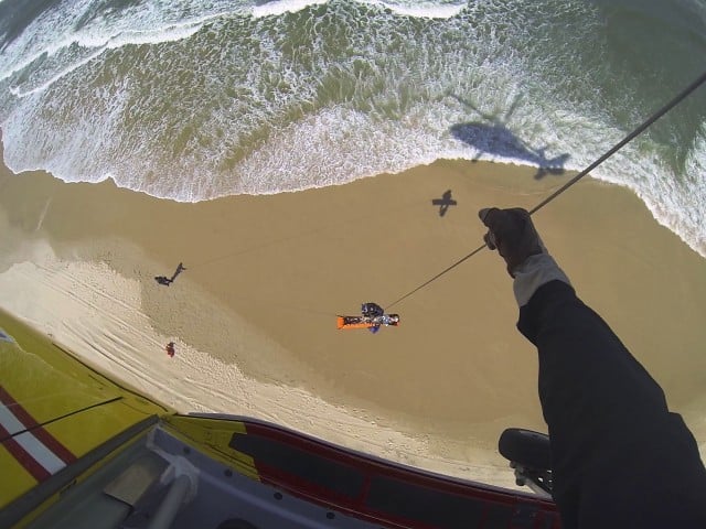 The injured woman is winched into the Westpac Lifesaver rescue helicopter. Photo supplied  