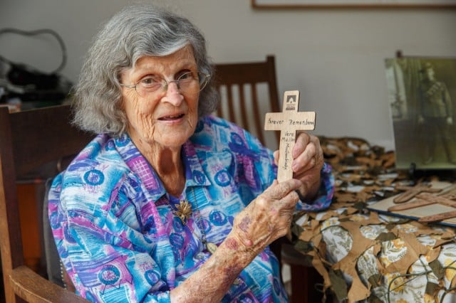 Vera Hinchliffe holds a cross she made in memory of her uncle Dennis Mullen, who sacrificed his life in 1917 during World War 1. Photo Eve Jeffery.