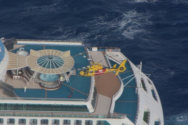 The Westpac Life Saver Rescue Helicopter approaches the Sea Princess.