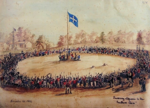 A painting showing miners swearing allegiance to the Southern Cross flag. (wikipedia)