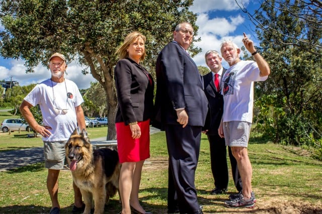 Our Lot 490 campaigners Ron Cooper, right, and Jeremy Cornford, left show Richmond MP Justine Elliott, NSW shadow minister for the north coast Walt Secord and Labor candidate for Tweed, Ron Goodman, second right, around the reserve yesterday.