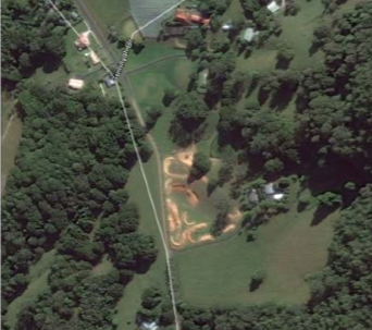 An aerial photo from Google Earth of the illegal motocross track being built at No. 137 Adcocks Road, Stokers Siding. 