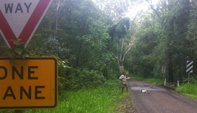 Rob English and his dog on narrow Gap Road leading to the Black Rocks campground in Bundjalung National Park. Photo supplied