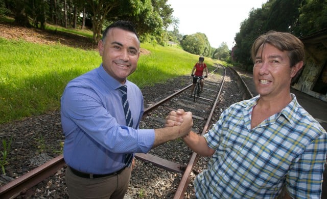 Six months ago NSW Nationals MP John Barilaro and rail trail advocate Cameron Arnold shook hands at at the $50m announcement in Bangalow. Photo Jeff Dawson