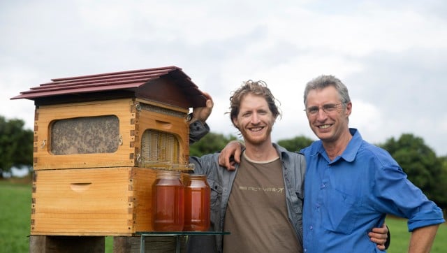North coast inventors Cedar (l) and Stuart Anderson with their revolutionary Flow hive.