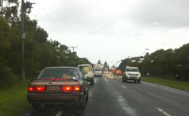 Traffic on Byron bay's main thoroughfare, Ewingsdale Road, is at a standstill this morning as council road crews work on cleaning up an oil spill.