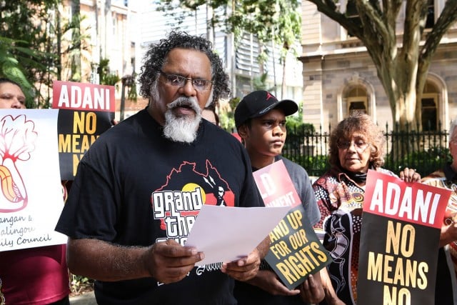 Traditional owner Adrian Burragubba announces the W&J resistance to the Adani Carmichael mine. Photo supplied.