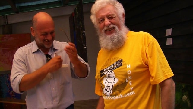 Professor Tim Flannery and Dieter Horstmann, the organiser of the Byron Solar Revolution symposium.  share a light moment during the sell-out event. Photo Sharon Shostak