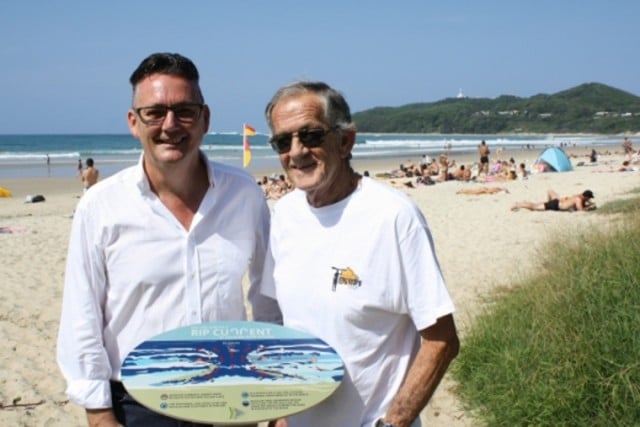 Byron surfing identity Max Pendergast, right, with Cr Paul Spooner after the launch last week of the new surf safety signs being erected along many of the shire's beaches. Photo supplied