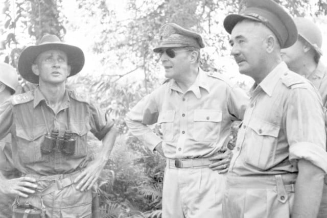 Lt Col Mervyn Jeanes (left) speaks with General Douglas MacArthur and Lt Gen Sir Leslie J. Morshead after forces land in North Borneo.