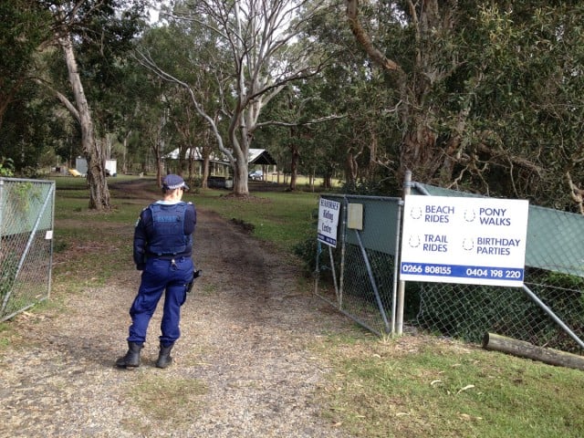 Police guard the site of the ultralight 'trike' crash at Tyagarah, Tuesday June 23. Photo Chris Dobney