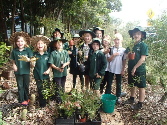 Brunswick Heads Public School's 'Eco Kids' during last Friday's tree-plating in the school's showpiece garden as part of National Tree Day. Photo supplied