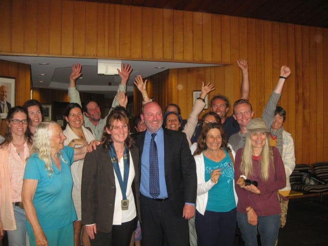 New mayor Katie Milne and new deputy mayor Gary Bagnall surrounded by supporters after their surprise election to the top roles.