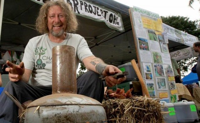 Dolph Cook at home with his biochar kiln.
