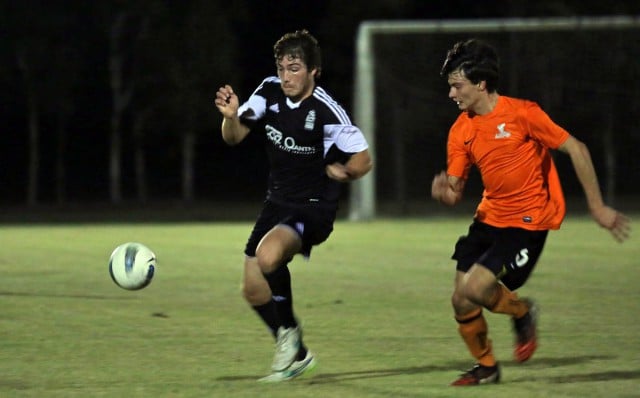 Adam Budd turns on the pace against Lennox Head.
