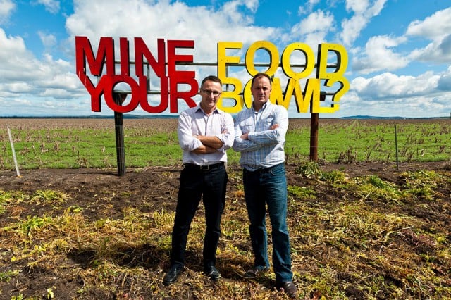 Greens MP Jeremy Buckingham, right, with national Greens leader Richard Di Natale in front of the famous protest sign on the Liverpool Plains. Image from Mr Buckingham’s Facebook page.