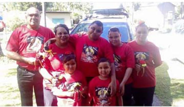 Mourners at yesterday's funeral of Grafton Aboriginal man David Dungay Hill Jnr, who died in police custody, wearing matching memorial T-shirts. Photo Facebook