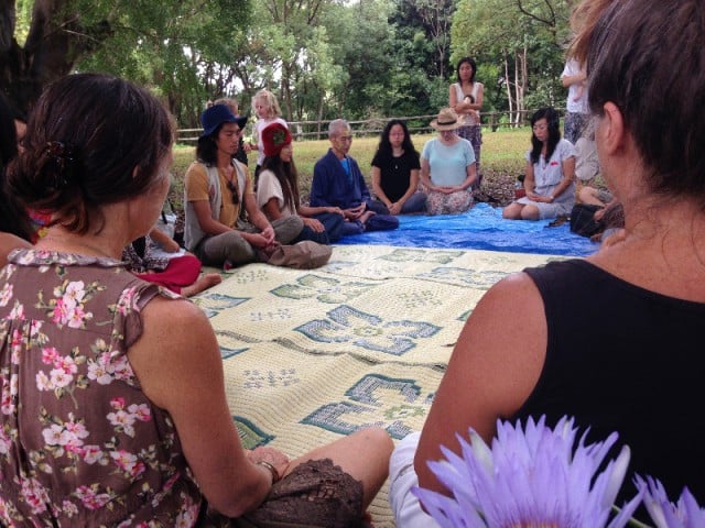 Silent witness: Master Hougen San conducts a Zen meditation session under the trees at Mullumbimby Farmers market on March 11 in memory of the Fukushima disaster. Photo Harsha Prabhu