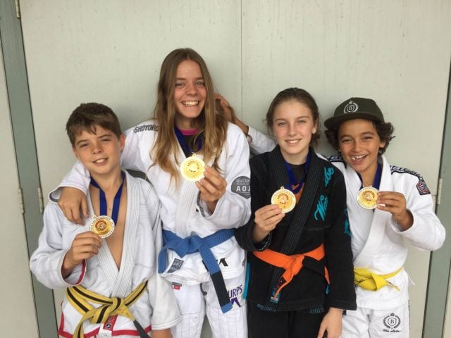 Byron Bay gym’s Extreme MMA Brazilian Jiu-Jitsu gold medalists Bryce McCourt, Milli McCourt, Louie Roasler and Chilli Harel.