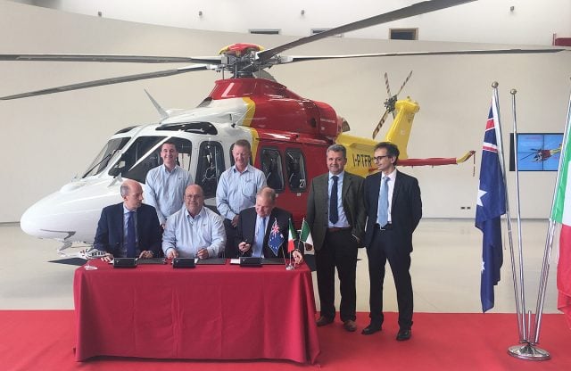 At the official handover of one of the new aircraft is Richard Jones (middle seated) with representatives of Augusta Westland and Westpac Rescue Helicopter Service.