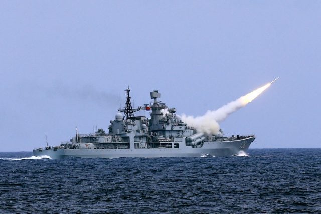 In August the Chinese destroyer Taizhou launches a missile during a live ammunition drill. Photo Dai Zongfeng/Xinhua via AP