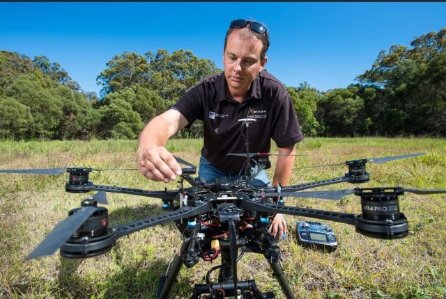 QUT aerospace engineer associate professor Felipe Gonzalez with the new heat-seeking drone. Photo QUT/Flickr