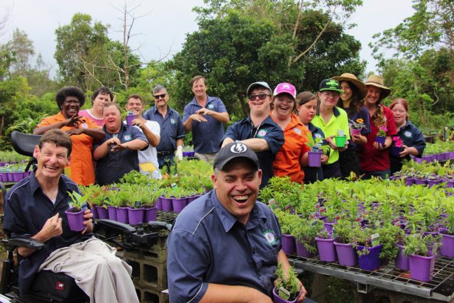 Byron Bay Herb Nursery staff showing the sign for ‘bee’. (Supplied)