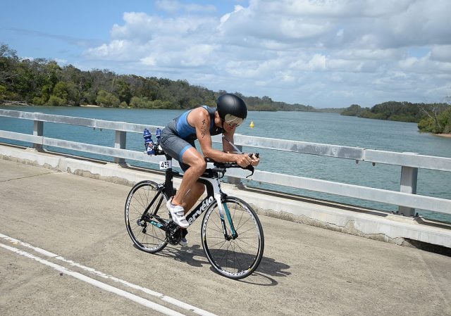 Triathletes had to cross Mooball Creek on the cycling stage of the Tweed Heads Enduro. Photo supplied