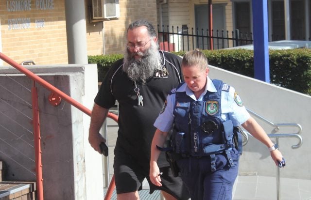 Big Rob gets a police escort after leaving the Lismore Local Court yesterday. (Picture: Paul Connelly of OneLoneDuck photography.)