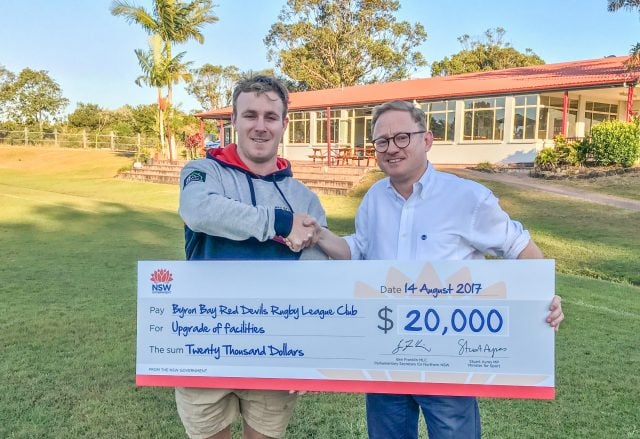 Red Devils Committee member Ben Webber and Nationals MLC Ben Franklin at Red Devil park with a very big cheque. Photo supplied.