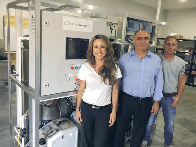 The Byron team of Dr Agatha Walczuk, Gheorghe Duta and Wes Walczuk with an Infinite Water filtration system. The system in their Byron office can produce 14,000 litres per day which can provide drinking water to around 700 homes. And that’s all on one power point.