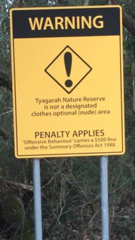 Police sign warning of penalties for going naked in the Tyagarah Nature Reserve outside the clothing optional area. Photo: Byron Bay Naturist Group Facebook page