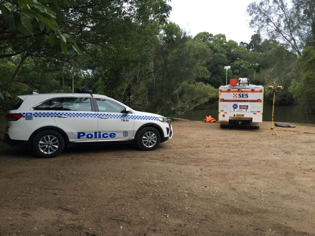 Mullumbimby SES and the police retrieving a dead body from the Brunswick River on Wednesday , November 29. Photo Aslan Shand.