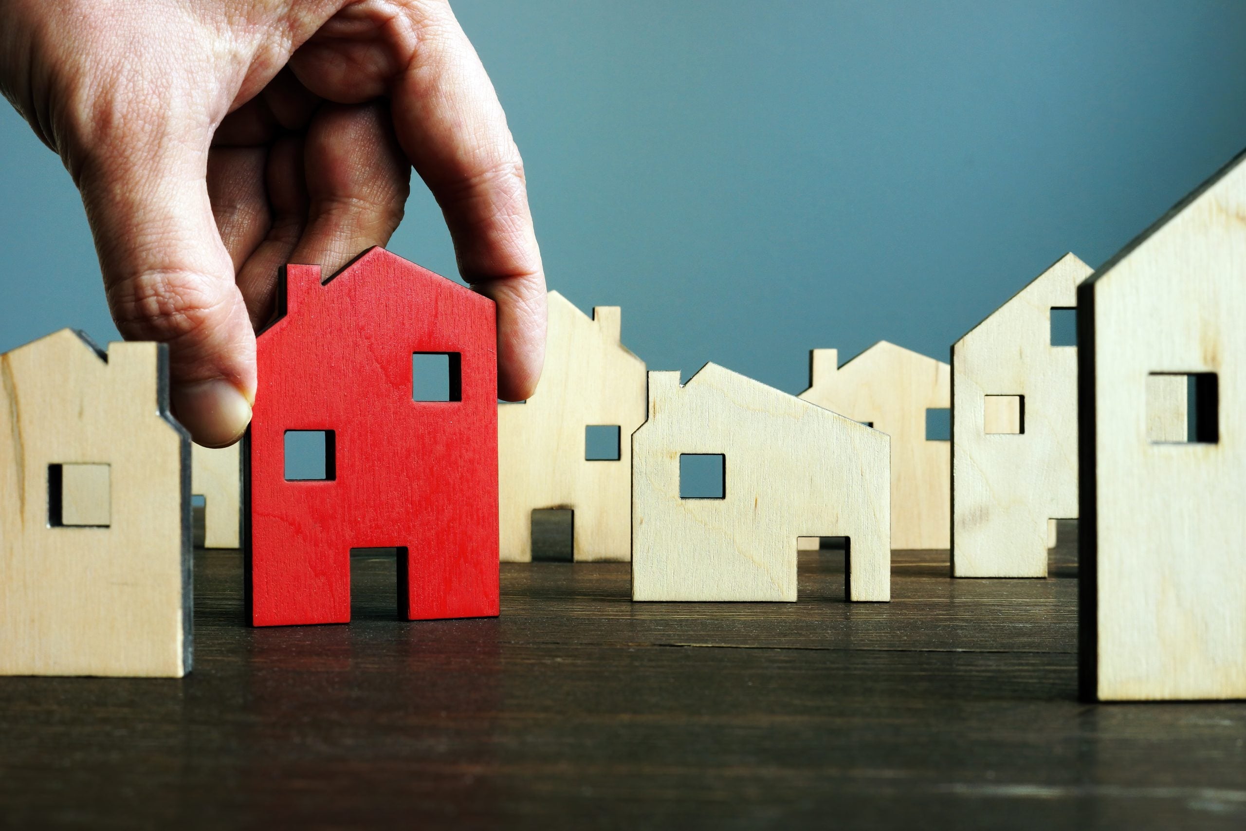 How are the government's budget changes impacting the housing market?