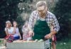 Free community BBQ for men and their families in Lismore man cooking with BBQ